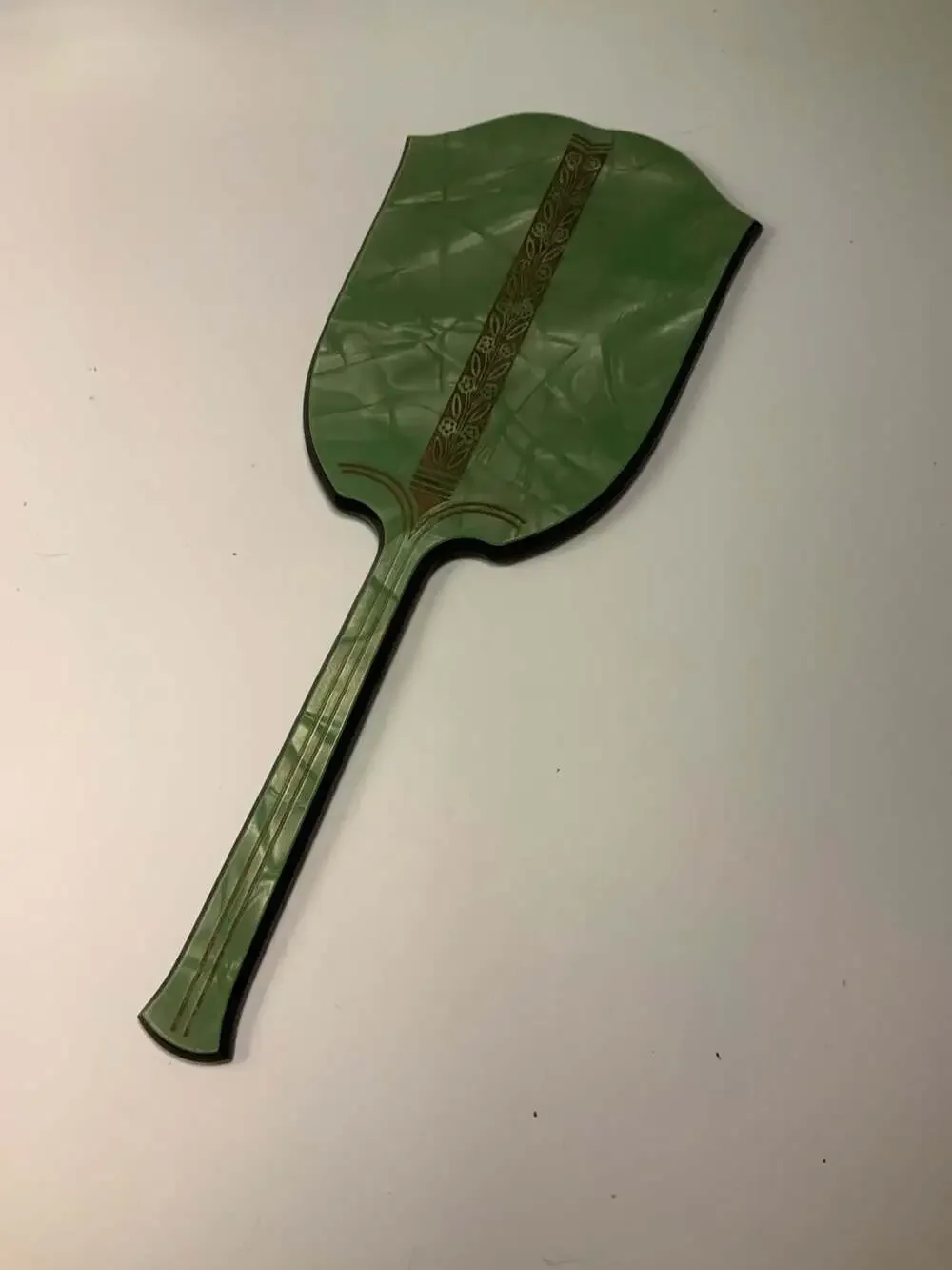 Vintage Art Deco Green Celluloid Hand Mirror With Floral Embossed Design